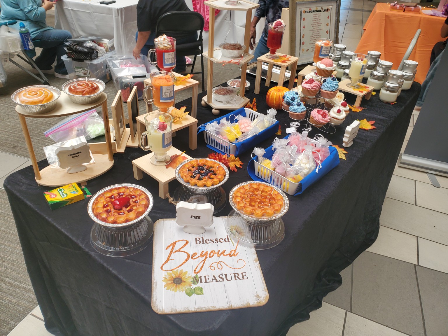 Island Candle Company fall festival table filled with pie, cupcake and drink candles