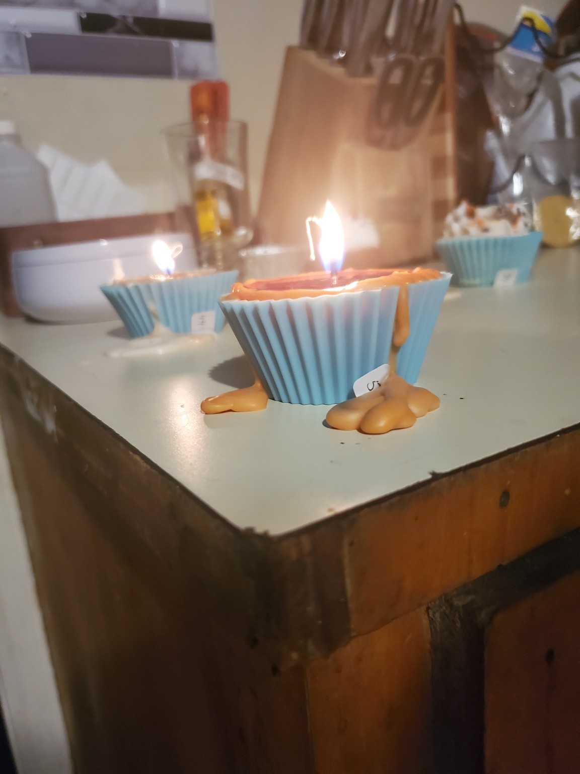 Failed cupcake candle burn test used to identify and correct a burn problem